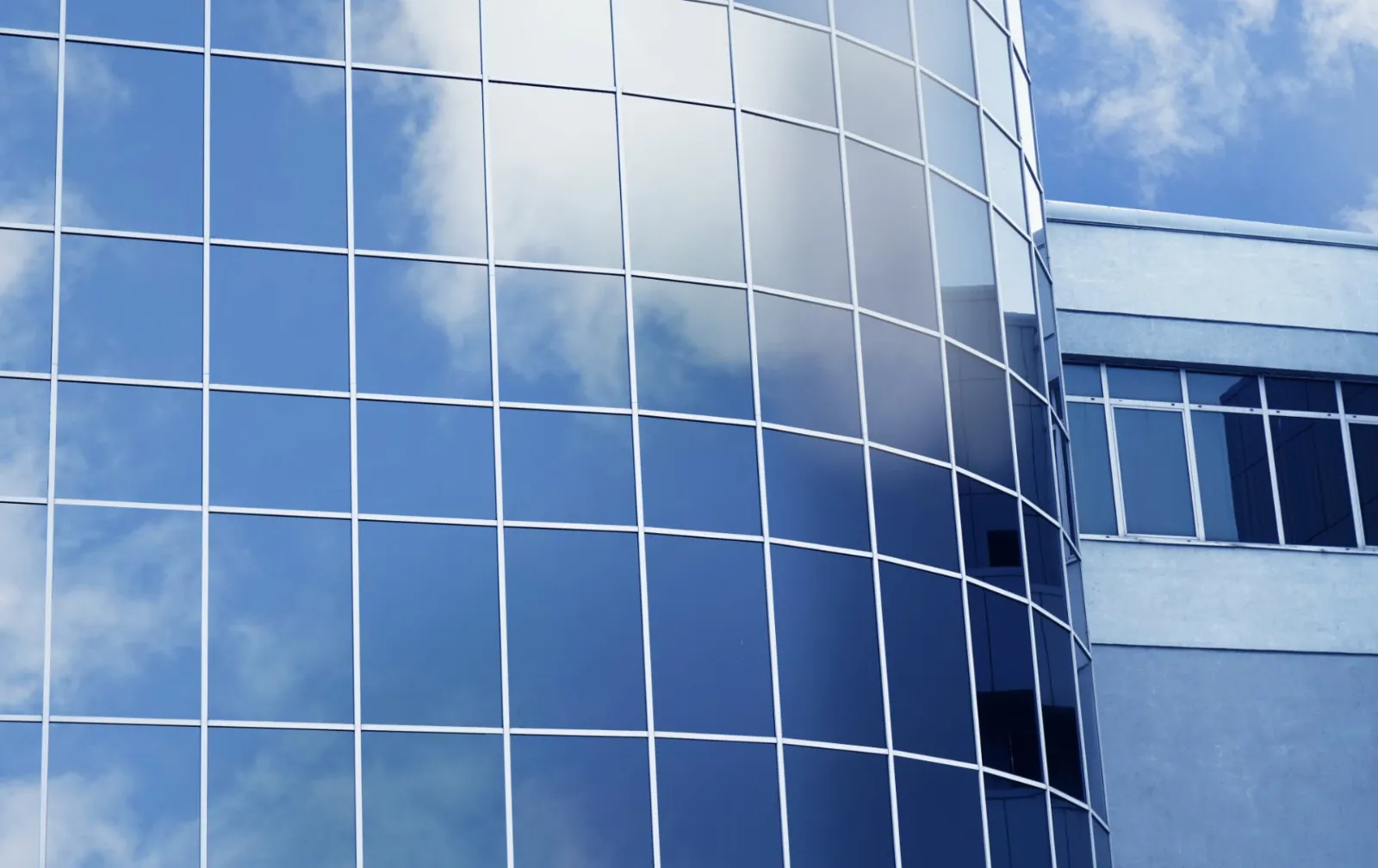 Curved blue glass facade