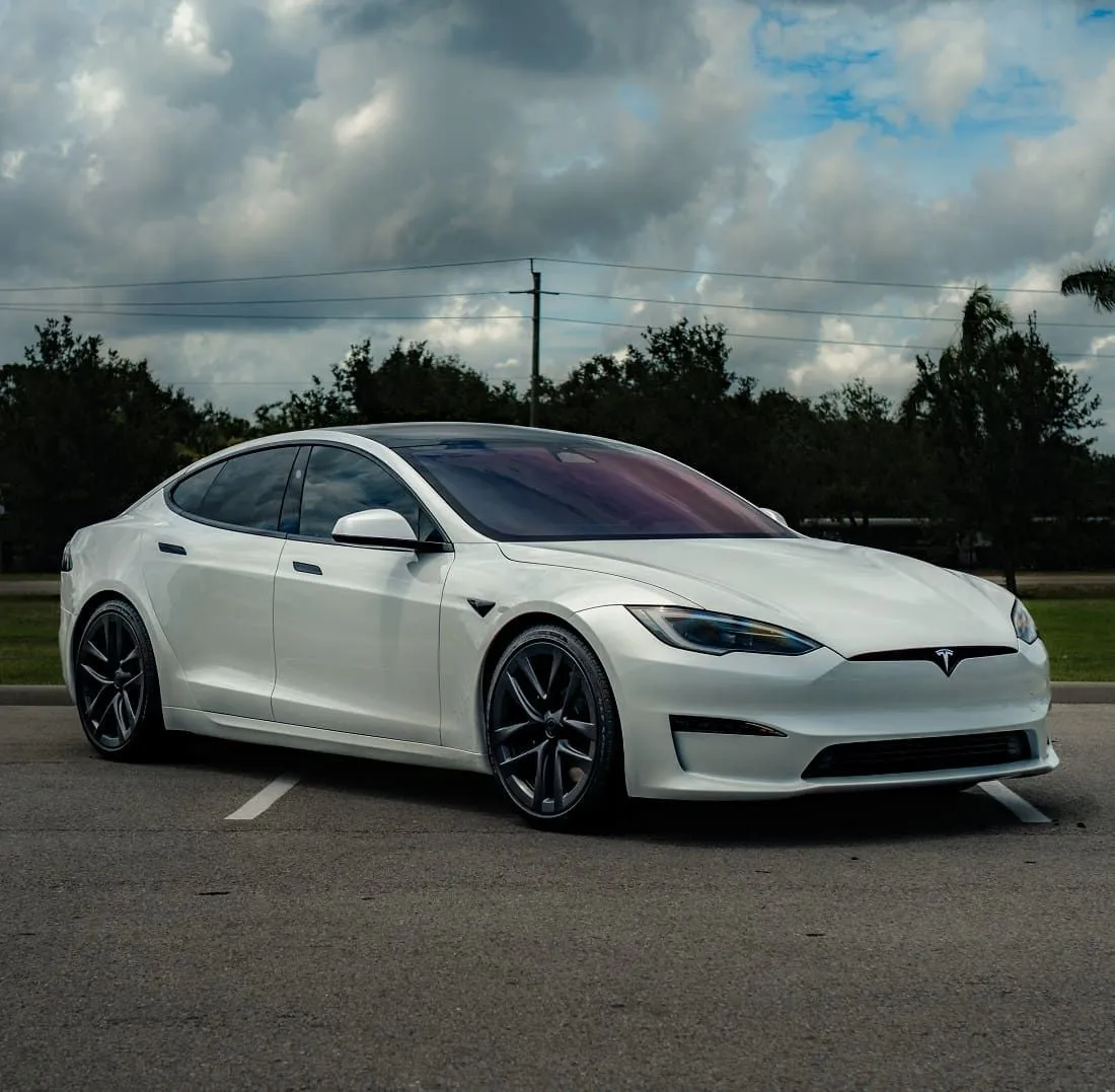 White Tesla Model S with tinted windows