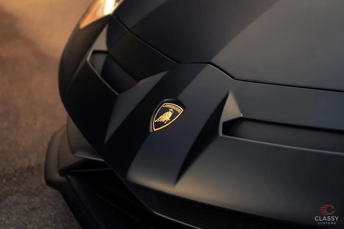 Close-up of a matte black Lamborghini hood
