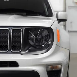 Jeep headlight with dark smoked headlight film