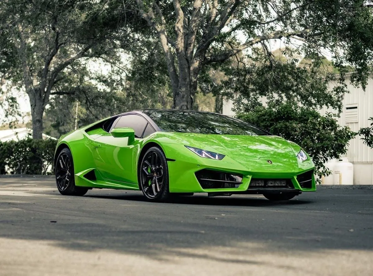 Lime green Lamborghini Huracan in the parking lot