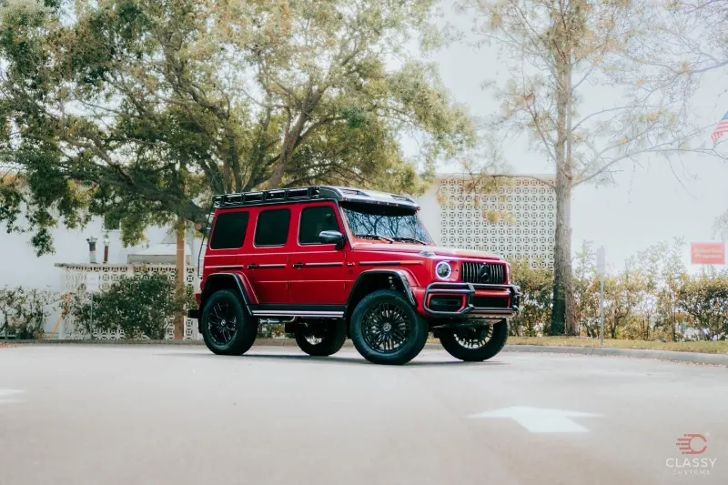 Red Jeep Wrangler with tinted windows