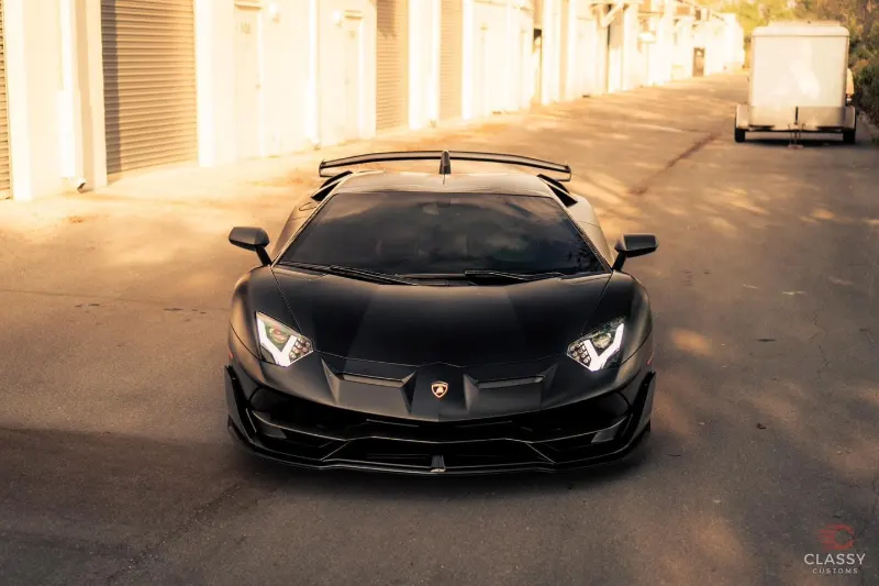 Front view of a black Lamborghini Aventador