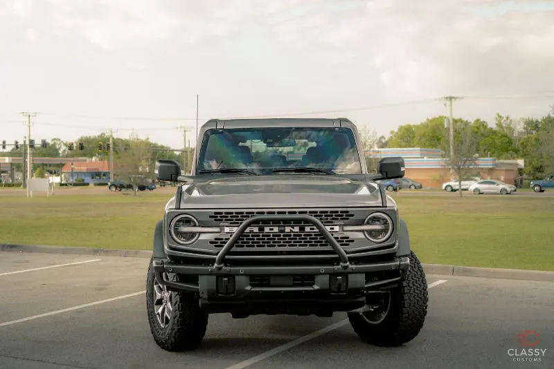 Lifted gray Ford Bronco with an off-road bumper