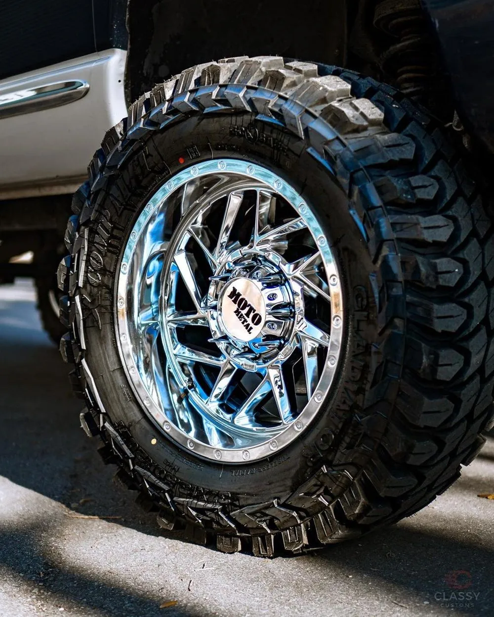 Chrome off-road wheel with a mud-terrain tire
