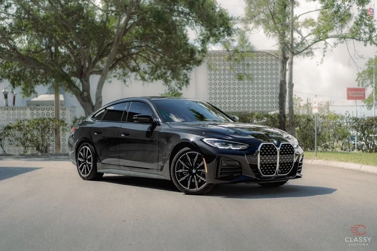 Black BMW 4 Series with tinted windows