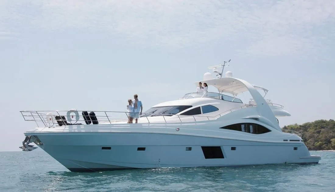White motor yacht on open water