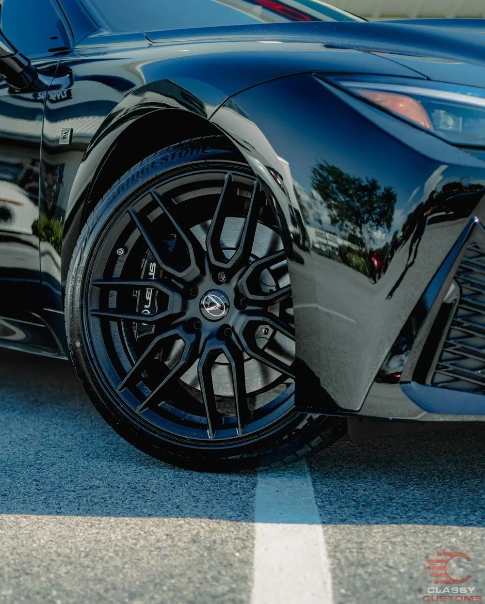 Black wheel on a black sports car