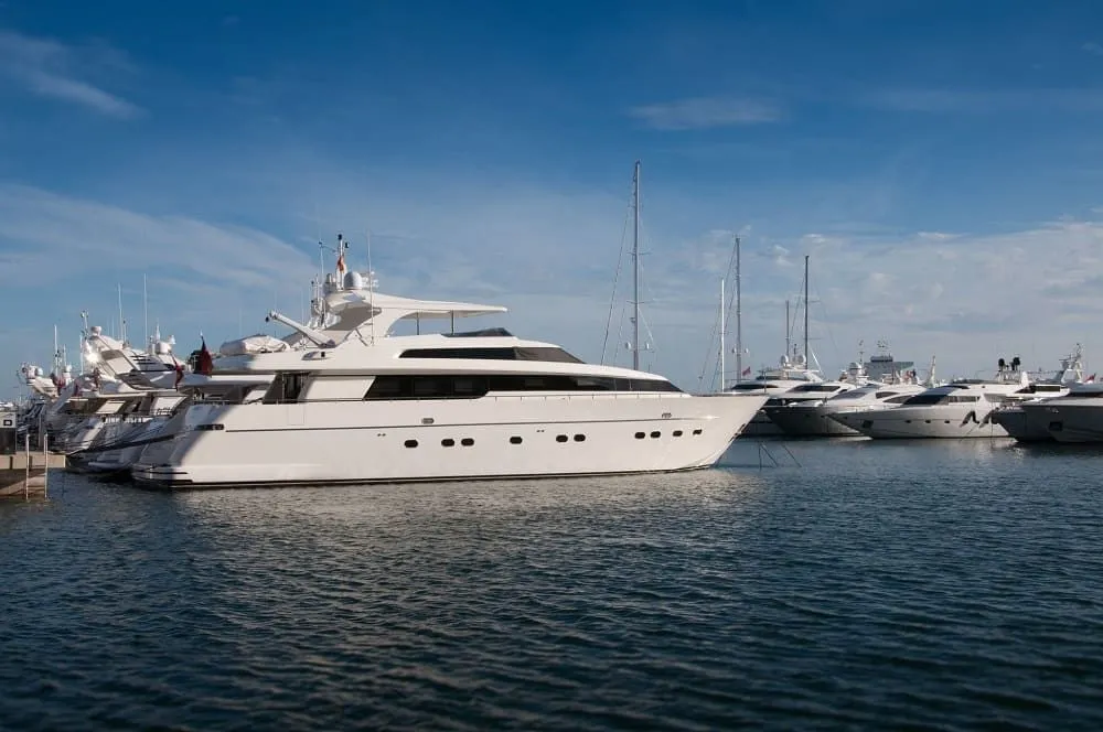 Yachts docked at a marina