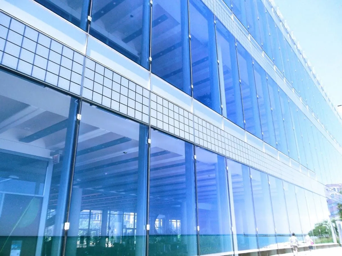 Blue glass facade of an office building
