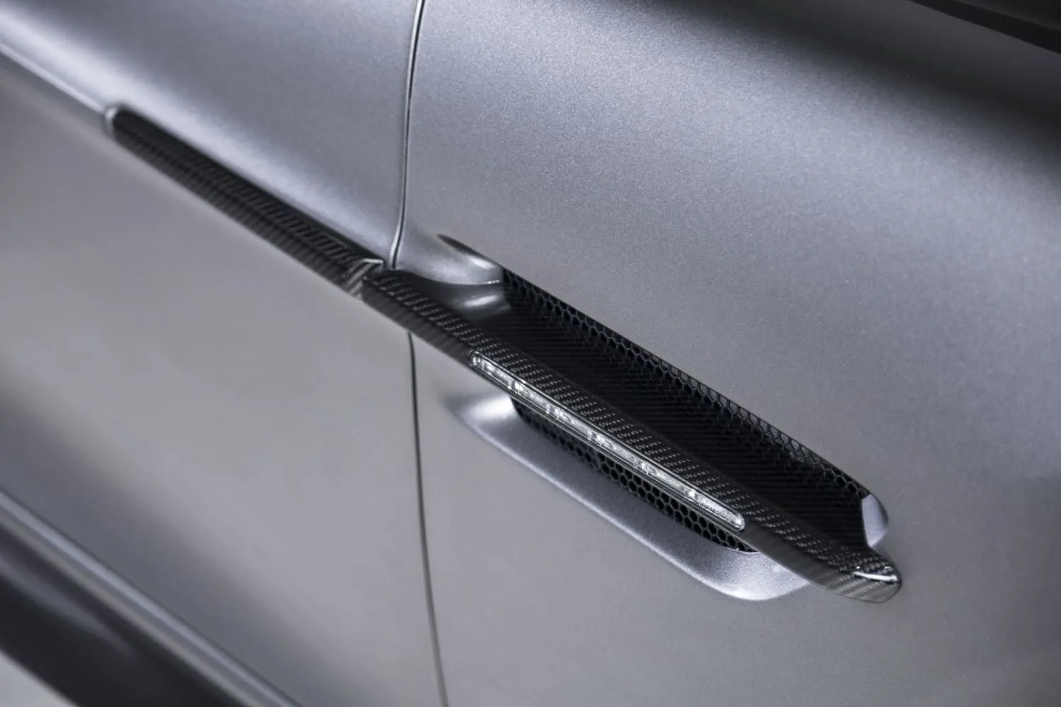 Close-up of black trim on a gray car